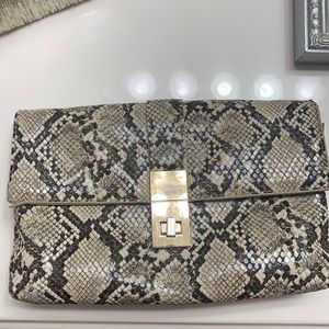 Altar’d State snakeskin print clutch